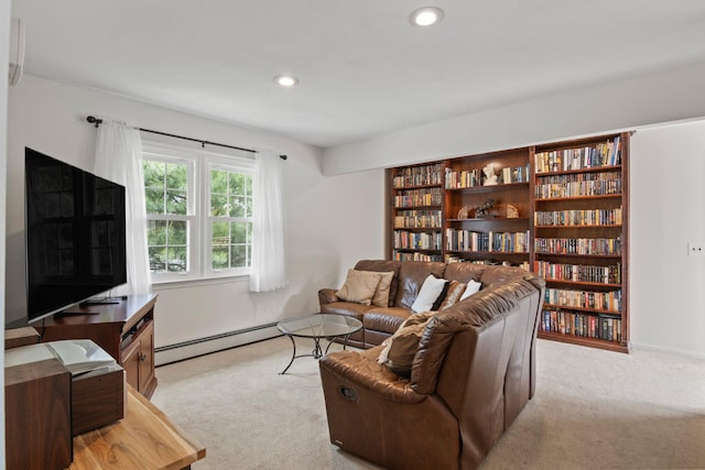 18 Chivalry Ln, Nesconset, NY 11767 - living area with light carpet, a baseboard radiator, and recessed lighting