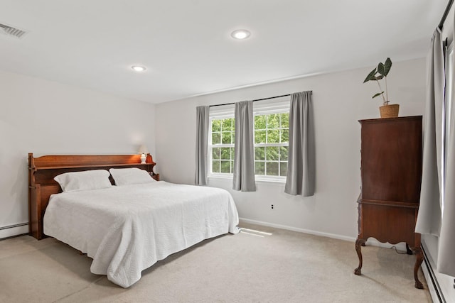 18 Chivalry Ln, Nesconset, NY 11767 - bedroom with light colored carpet, baseboards, baseboard heating, and recessed lighting