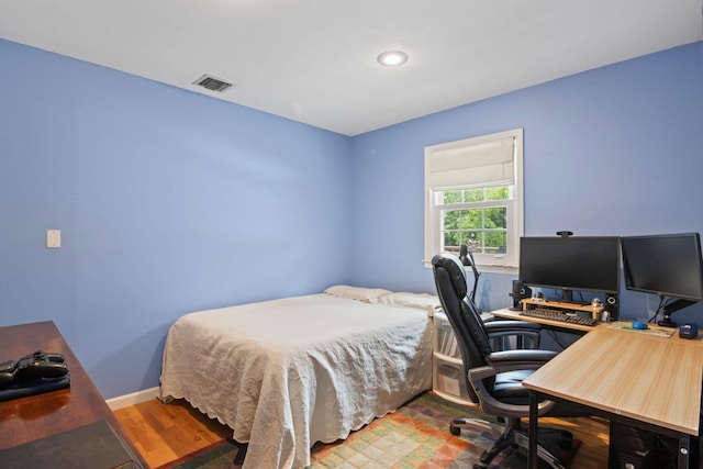 18 Chivalry Ln, Nesconset, NY 11767 - bedroom with wood finished floors, a desk, and baseboards