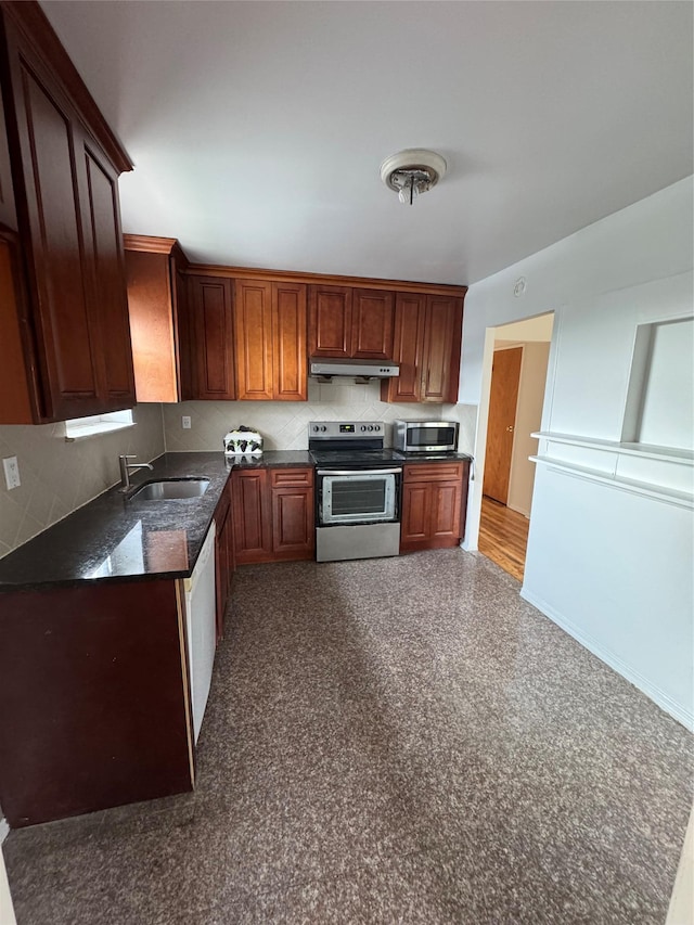 25-72 127th St, Flushing, NY 11354 - kitchen featuring appliances with stainless steel finishes and under cabinet range hood