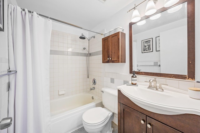 219 Berry St Unit 2, Brooklyn, NY 11249 - bathroom with shower / tub combo, vanity, toilet, and tile walls