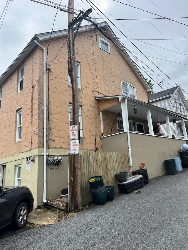 29 Tobins Ln, Highland Falls, NY 10928 - view of side of home featuring stucco siding