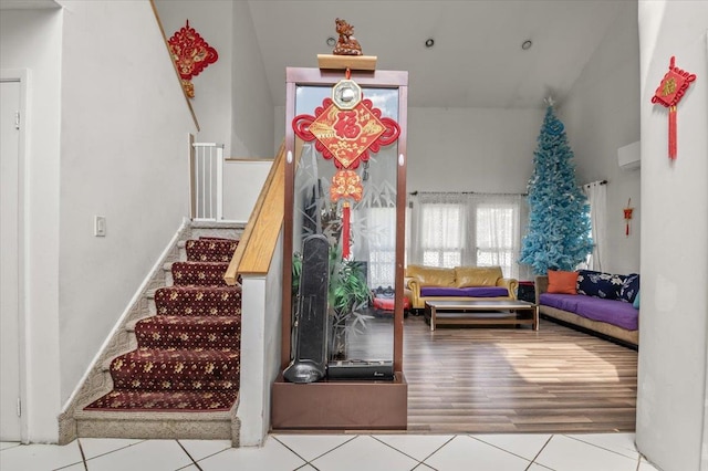 204 Carnation Dr, Farmingdale, NY 11735 - building lobby featuring stairs and a high ceiling