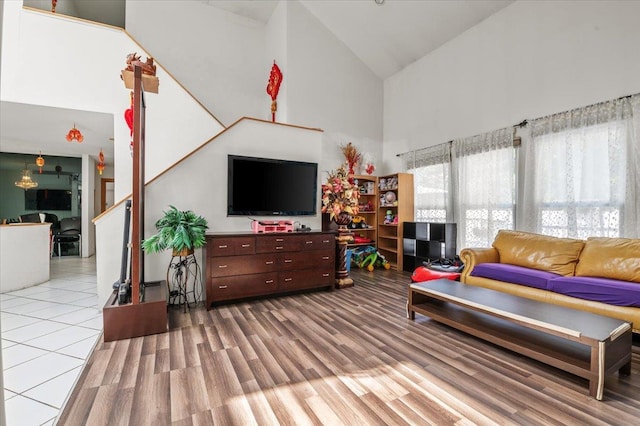 204 Carnation Dr, Farmingdale, NY 11735 - living room with high vaulted ceiling and wood finished floors