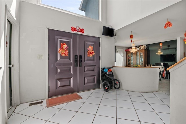 204 Carnation Dr, Farmingdale, NY 11735 - tiled entrance foyer with french doors and a high ceiling