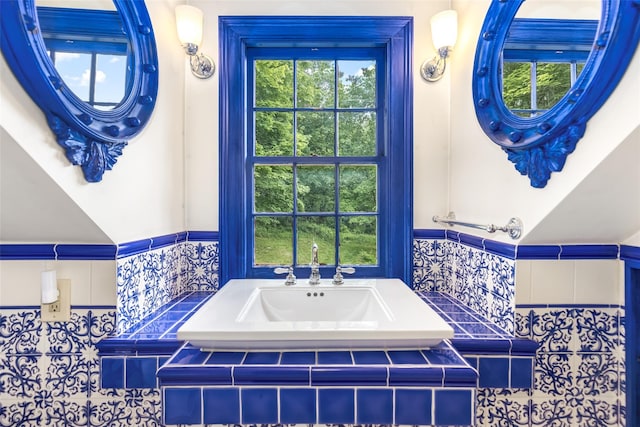 1282 Old Post Rd, Ulster Park, NY 12487 - bathroom with a wainscoted wall, healthy amount of natural light, and a sink