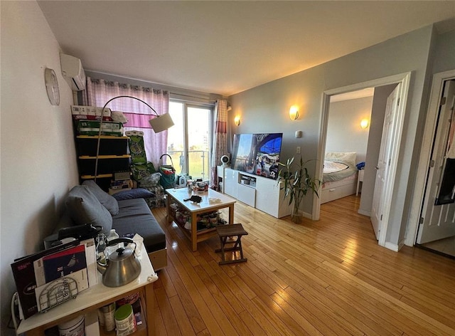 136-21 Latimer Pl Unit 5H, Flushing, NY 11354 - living room featuring light wood-type flooring and a wall mounted AC