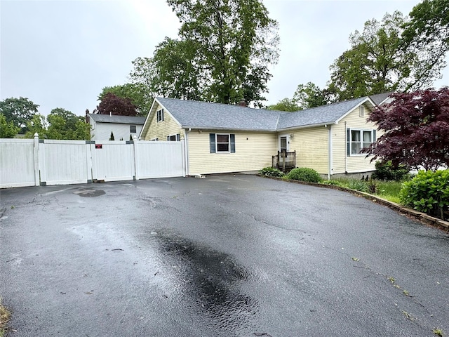39 Palm Rd, Rocky Point, NY 11778 - ranch-style house with asphalt driveway