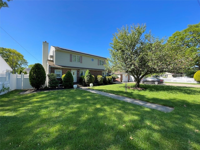 74 Webster Ave, West Islip, NY 11795 - view of front of house featuring a chimney and brick siding