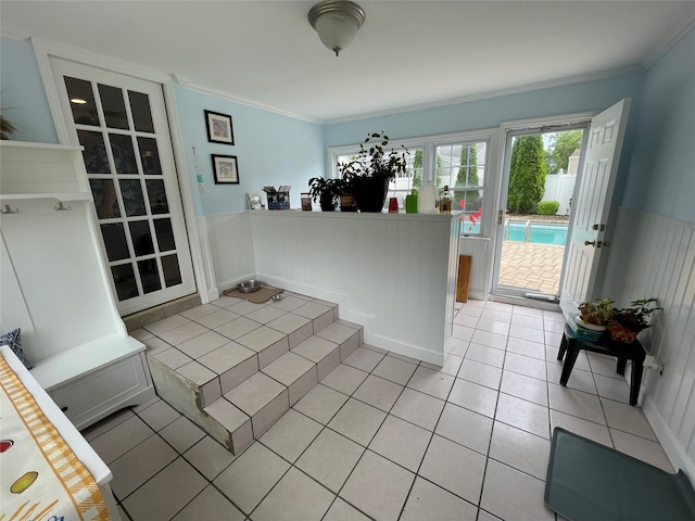 74 Webster Ave, West Islip, NY 11795 - kitchen with wainscoting, crown molding, and light tile patterned floors
