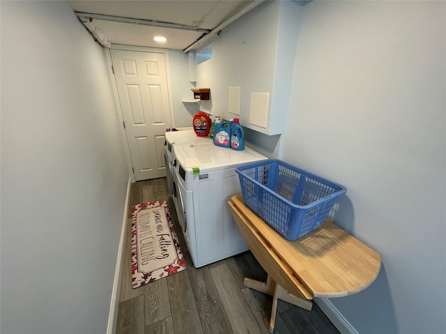 74 Webster Ave, West Islip, NY 11795 - laundry room with independent washer and dryer, dark wood-type flooring, and baseboards