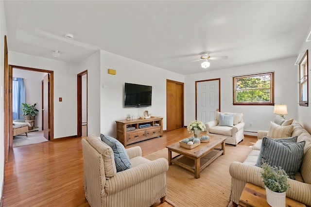 89 Brown Rd, Wappingers Falls, NY 12590 - living area featuring light wood-style floors, a ceiling fan, and baseboards