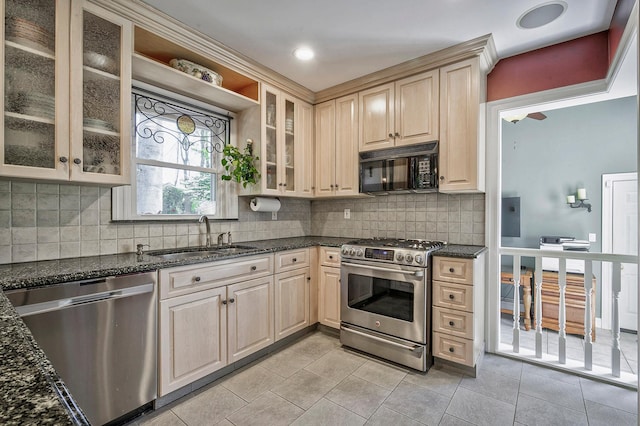 23 S Sixth St, Locust Valley, NY 11560 - kitchen with appliances with stainless steel finishes, a sink, tasteful backsplash, and light tile patterned floors