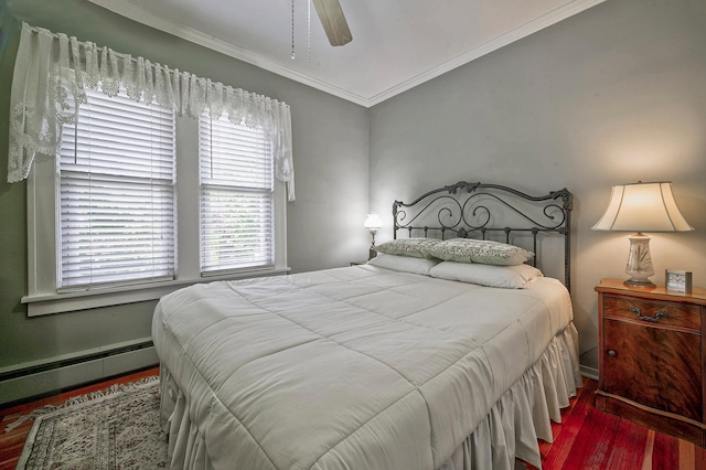 23 S Sixth St, Locust Valley, NY 11560 - bedroom featuring wood finished floors, crown molding, baseboard heating, baseboards, and a ceiling fan