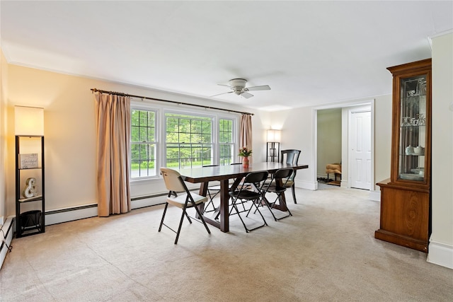 323 Harris Rd, Monticello, NY 12701 - dining space featuring light colored carpet, a ceiling fan, baseboard heating, and baseboards