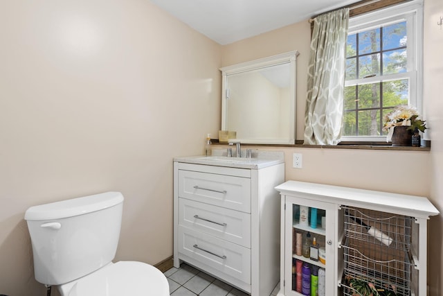 323 Harris Rd, Monticello, NY 12701 - half bathroom featuring toilet, vanity, and tile patterned flooring