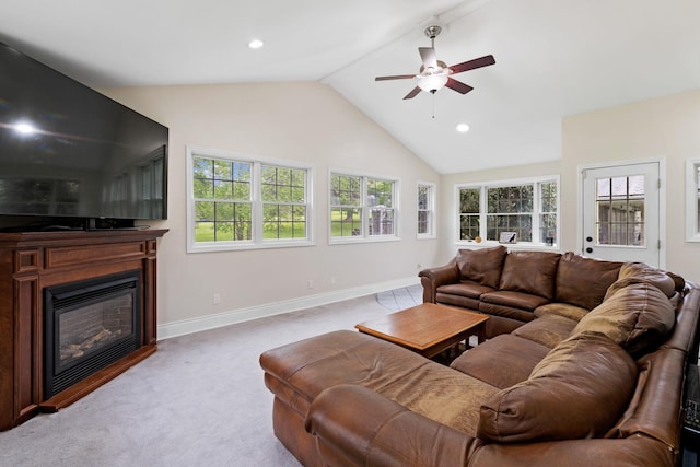 323 Harris Rd, Monticello, NY 12701 - living room featuring a ceiling fan, lofted ceiling, a glass covered fireplace, carpet floors, and baseboards