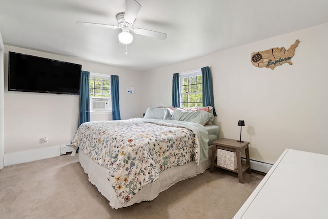 323 Harris Rd, Monticello, NY 12701 - bedroom featuring a baseboard heating unit, baseboard heating, light colored carpet, and multiple windows