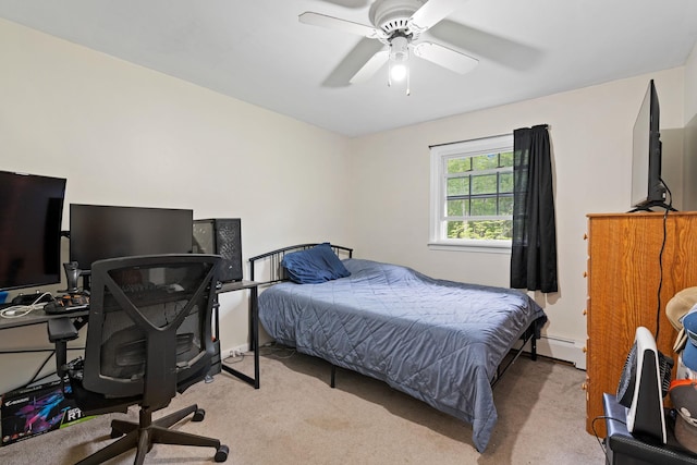 323 Harris Rd, Monticello, NY 12701 - bedroom with a baseboard heating unit, carpet, and a ceiling fan