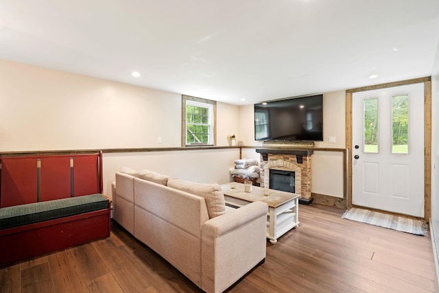 323 Harris Rd, Monticello, NY 12701 - living room featuring hardwood / wood-style flooring, a fireplace, and recessed lighting