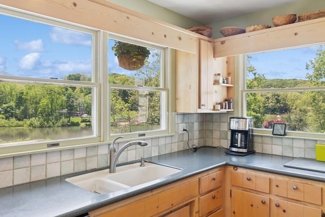 43 Hill St, Wading River, NY 11792 - kitchen featuring a sink and tasteful backsplash