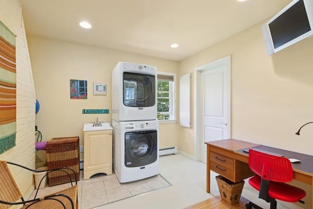 43 Hill St, Wading River, NY 11792 - washroom with estacked washer and dryer, a baseboard radiator, an office area, cabinet space, and recessed lighting