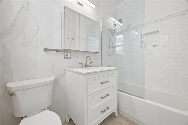 27 Locust Ave Unit 4N, New Rochelle, NY 10801 - full bathroom with toilet, vanity, bathing tub / shower combination, and tile walls