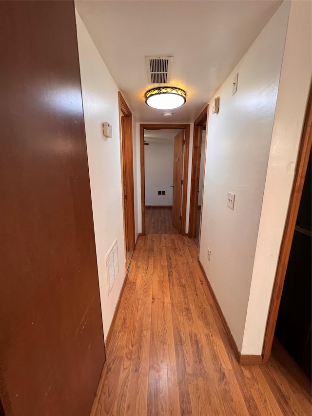 6 Farmingdale Ln, Bloomingburg, NY 12721 - corridor with light wood-style flooring and baseboards