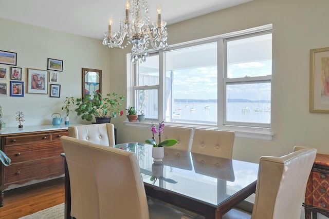 103 Gedney St Unit 2N, Nyack, NY 10960 - dining space with a chandelier and wood finished floors