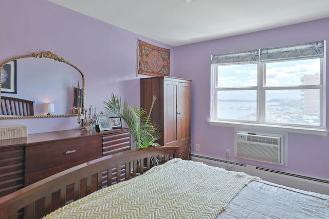 103 Gedney St Unit 2N, Nyack, NY 10960 - bedroom featuring a baseboard radiator and a wall mounted air conditioner