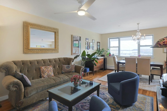 103 Gedney St Unit 2N, Nyack, NY 10960 - living area featuring a chandelier, wood finished floors, and ceiling fan
