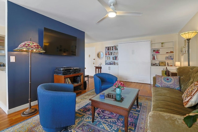 103 Gedney St Unit 2N, Nyack, NY 10960 - living area with wood finished floors, ceiling fan, built in features, and baseboards