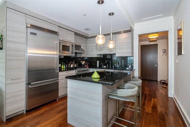 5 Renaissance Sq Unit 17B, White Plains, NY 10601 - kitchen featuring built in appliances, modern cabinets, dark countertops, and crown molding
