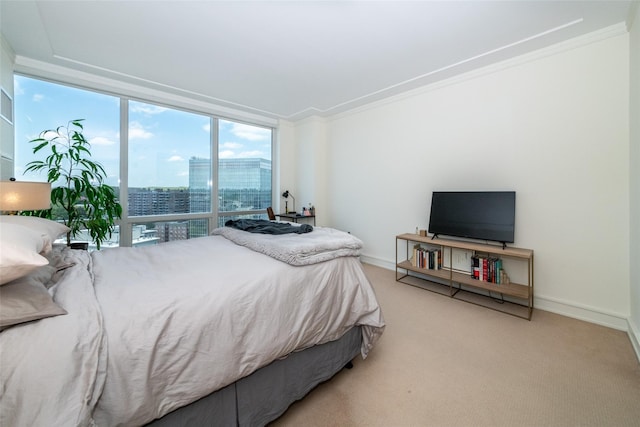5 Renaissance Sq Unit 17B, White Plains, NY 10601 - bedroom with expansive windows, carpet flooring, crown molding, and baseboards