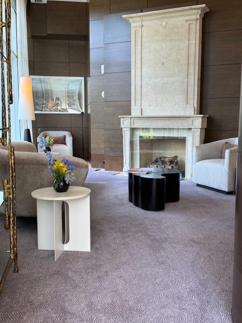 5 Renaissance Sq Unit 17B, White Plains, NY 10601 - living room with carpet flooring and a fireplace