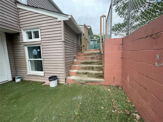 10 Kirby Ln, Central Islip, NY 11722 - view of side of property featuring a lawn