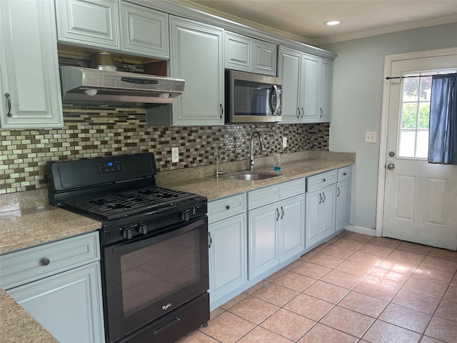 10 Kirby Ln, Central Islip, NY 11722 - kitchen featuring black gas range, stainless steel microwave, a sink, under cabinet range hood, and crown molding