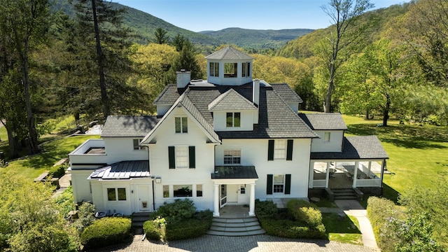 390 Erpf Rd, Arkville, NY 12406 - view of front of property with a chimney, a wooded view, a front yard, and a mountain view