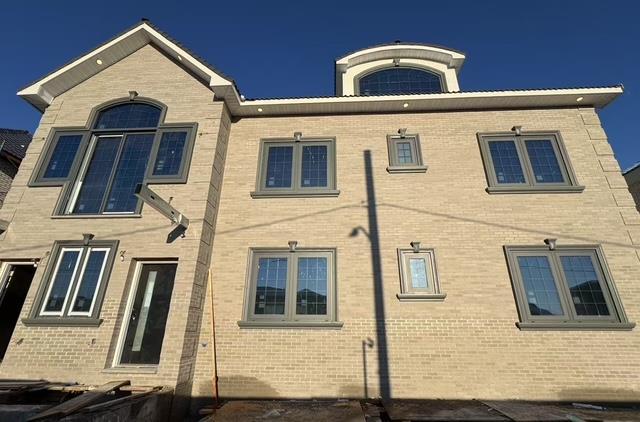 150-29 Hawtree St, Ozone Park, NY 11417 - view of side of home with brick siding