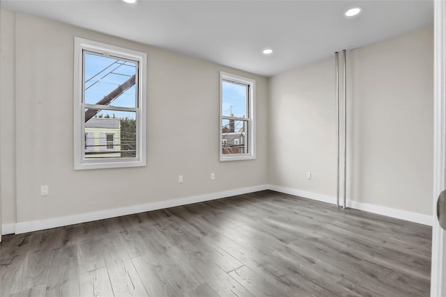 305 Union Ave, New Rochelle, NY 10801 - spare room with healthy amount of natural light, wood finished floors, recessed lighting, and baseboards
