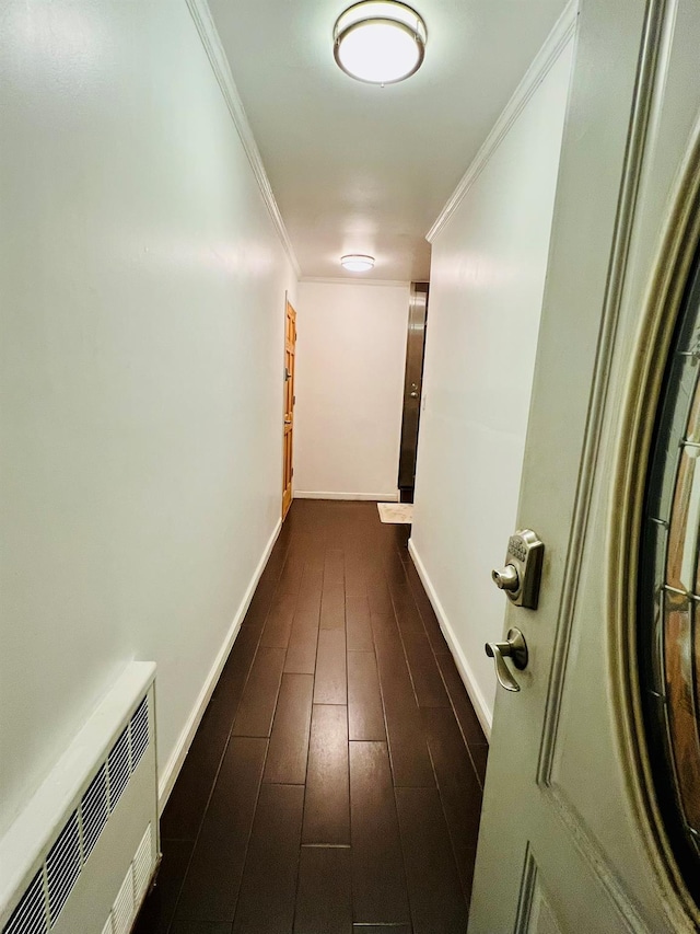 5-41 117th St, College Point, NY 11356 - hallway with dark wood-type flooring, baseboards, and crown molding