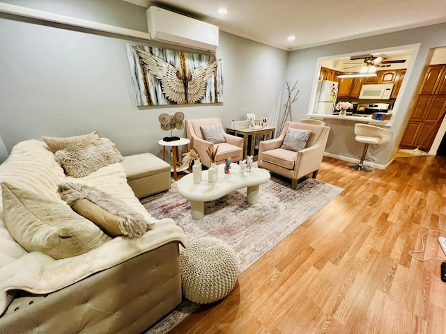 5-41 117th St, College Point, NY 11356 - living area with light wood-style floors, recessed lighting, a ceiling fan, and a wall unit AC