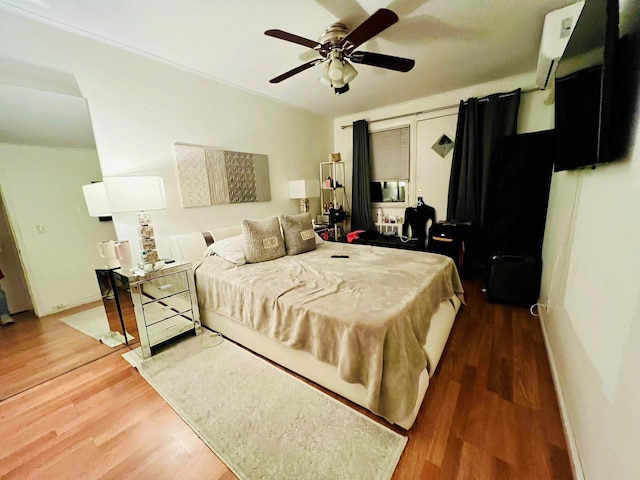 5-41 117th St, College Point, NY 11356 - bedroom featuring wood finished floors and ceiling fan