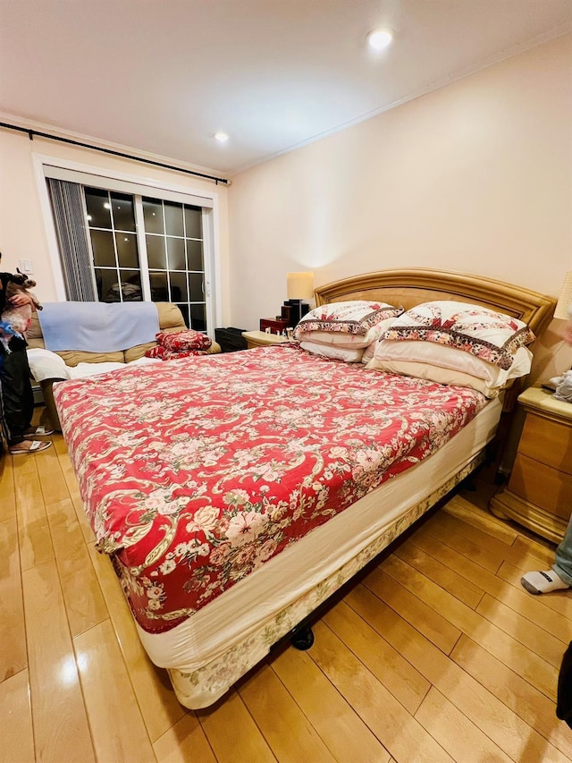 5-41 117th St, College Point, NY 11356 - bedroom with light wood-style flooring and recessed lighting