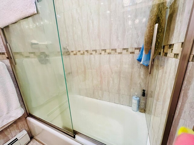 5-41 117th St, College Point, NY 11356 - bathroom featuring a baseboard radiator and shower / bath combination with glass door