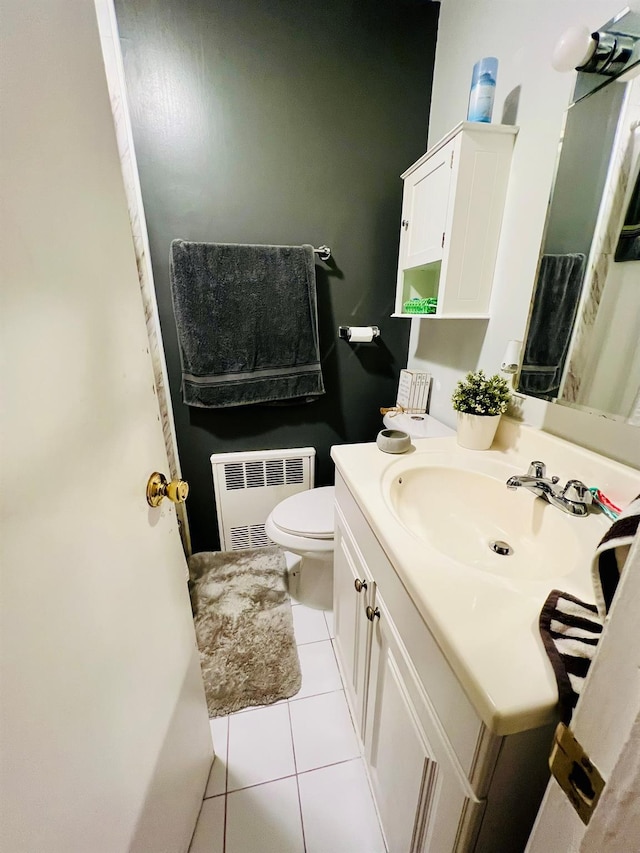 5-41 117th St, College Point, NY 11356 - full bathroom with radiator heating unit, tile patterned flooring, vanity, toilet, and a shower with curtain