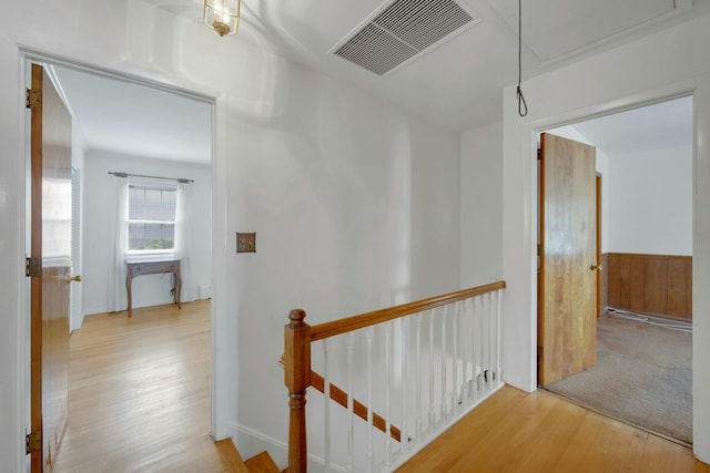 115 Fowler Ave, Yonkers, NY 10701 - hallway with an upstairs landing, attic access, and wood finished floors
