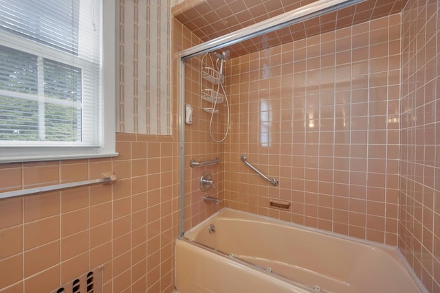 115 Fowler Ave, Yonkers, NY 10701 - full bathroom featuring enclosed tub / shower combo and tile walls