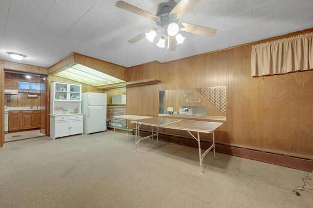 115 Fowler Ave, Yonkers, NY 10701 - office with wood walls, a ceiling fan, carpet floors, and a sink