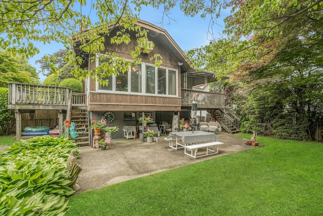 115 Fowler Ave, Yonkers, NY 10701 - rear view of property featuring stairway, a patio area, a sunroom, a wooden deck, and a lawn